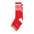 Pair of red crew socks with a white 'Do Not Disturb' message and white stripes. Small logo near the toes.