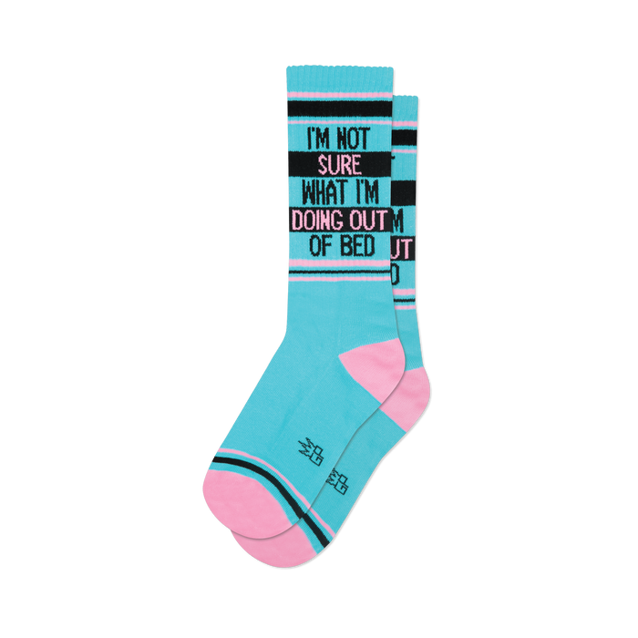 Pair of teal crew socks with pink and black stripes.  Text reads: 'I'm not sure what I'm doing out of bed'.