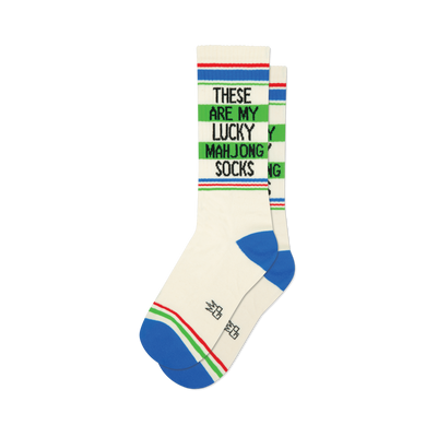 Pair of off-white crew socks with blue, green, and red stripes at the top and bottom. Text reads: 'These Are My Lucky Mahjong Socks'.