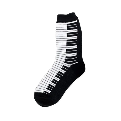 Black and white crew socks featuring a piano keyboard design.  The white keys are on one side and the black keys on the other.