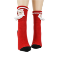 Close-up of Santa 3D socks on a model's feet, showing the design detail.