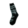 Black crew socks with a white musical notation design, including treble clefs and notes. 