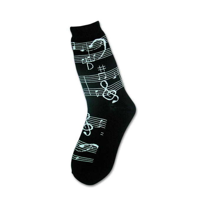 black crew socks with white music notes, treble clefs, quarter and eighth notes, sharps, and flats. for women.  