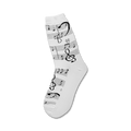 Close-up of white crew socks with black musical notes and clefs.