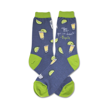 novelty women's blue crew socks with tequila-related images including shot glasses, lime wedges, and the phrase "yes, you can dance".   
