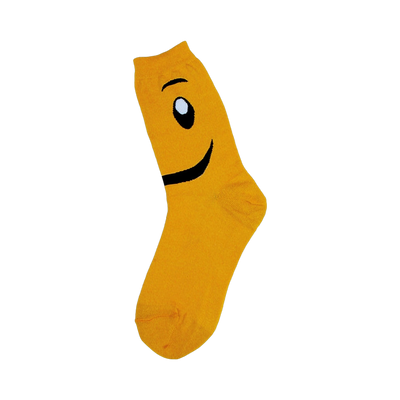 Crew socks in bright yellow with a black and white smiley face design on the top.