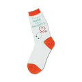 White crew socks with orange cuffs, featuring a teal phrase 'Being a nurse takes PATIENTS', a heart-shaped stethoscope graphic, and gray accents.