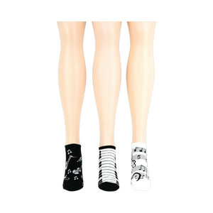 Lifestyle shot: another different angle showing three pairs of musical socks on mannequin legs.