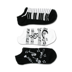 Three pairs of ankle socks; one black with musical instruments, one black and white piano keys, and one white with musical notes.