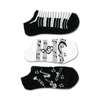 women's musical 3 pack no show socks feature piano keys, musical notes, and instruments.   