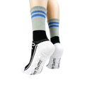 Back view of the socks, showcasing the non-skid grips on the soles.