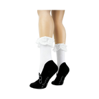 Close-up view of the socks on a model's legs, showcasing the lace detail and slipper print.