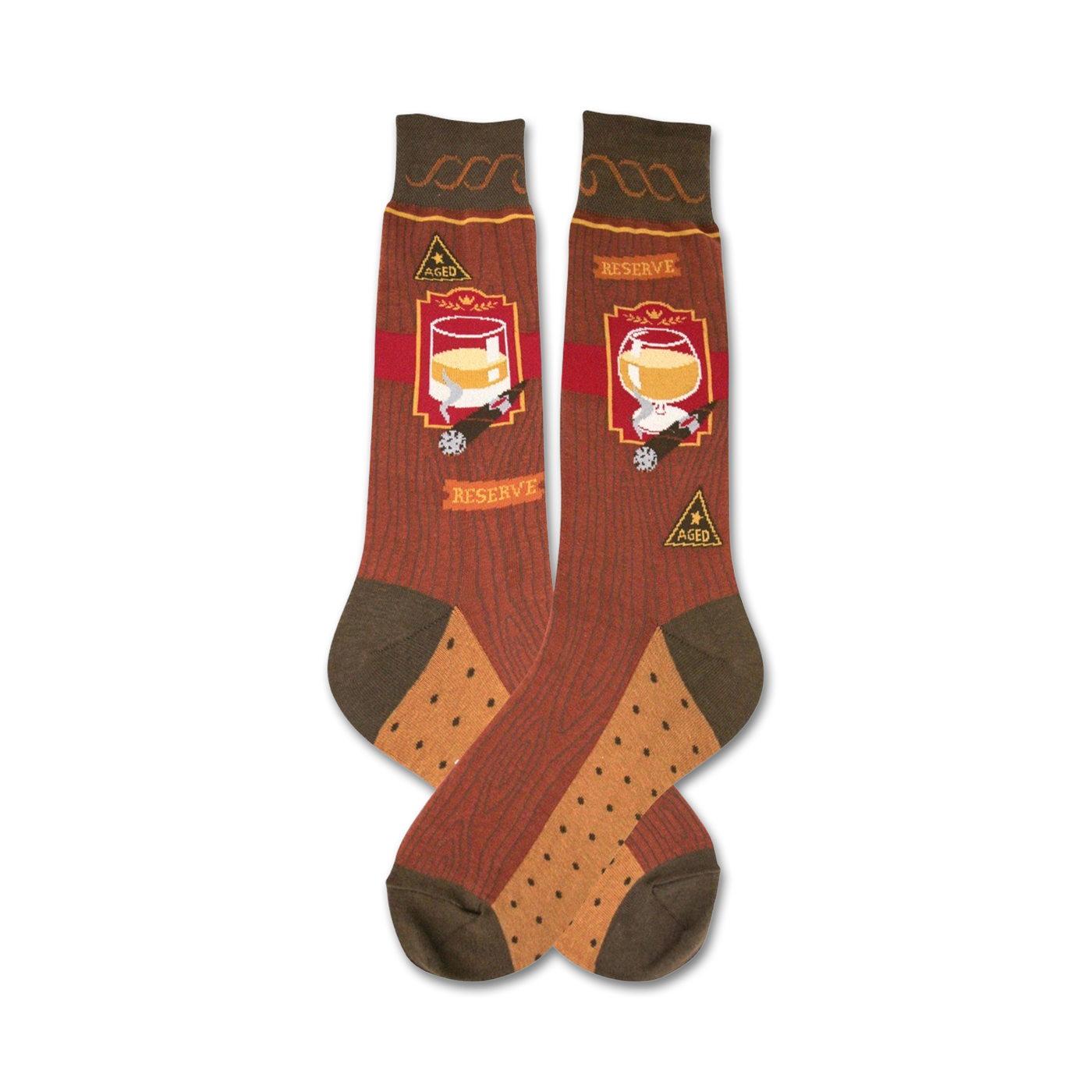 A pair of crew socks in brown and tan with a woodgrain pattern, a glass of bourbon, a cigar, and 'Aged' and 'Reserve' labels.