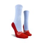 Pair of red and light blue non-skid slipper socks.  The bottom features red slipper design with a bow and non-skid grips.