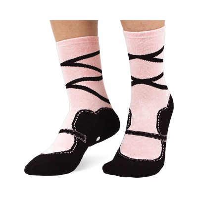 Light pink crew socks featuring a printed black ballet slipper design with faux stitching and criss-cross ankle ribbons.
