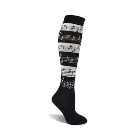 black knee-high women's socks featuring a white music note pattern.  