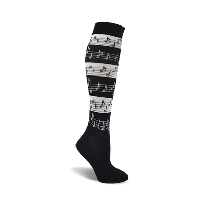 black knee-high women's socks featuring a white music note pattern.  