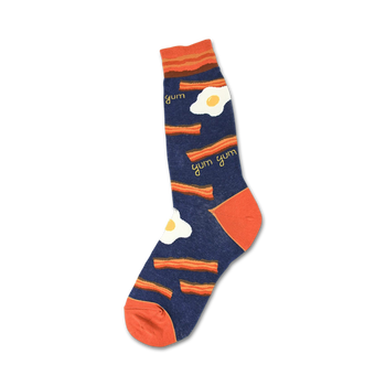 orange bacon strips and sunny side up eggs pattern on blue mens crew socks.   