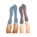 Pair of Shark Bite 3D socks, one grey and one blue, on crossed legs.