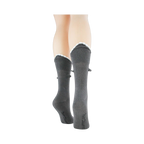 Back view of grey Shark Bite 3D socks on a mannequin leg, showcasing the scalloped cuff.