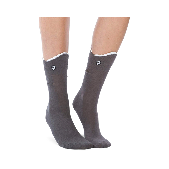 Grey crew socks with a white shark-bite cuff and embroidered shark eye detail. 