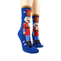 Lifestyle shot showing the Nutcracker slipper socks on a model's feet.