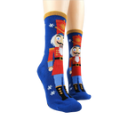 Lifestyle shot showing the Nutcracker slipper socks on a model's feet.
