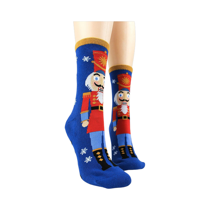 Lifestyle shot showing the Nutcracker slipper socks on a model's feet.