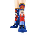 Close-up showcasing the detailed Nutcracker illustration on the socks.