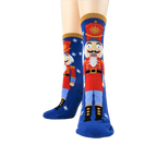 Close-up showcasing the detailed Nutcracker illustration on the socks.