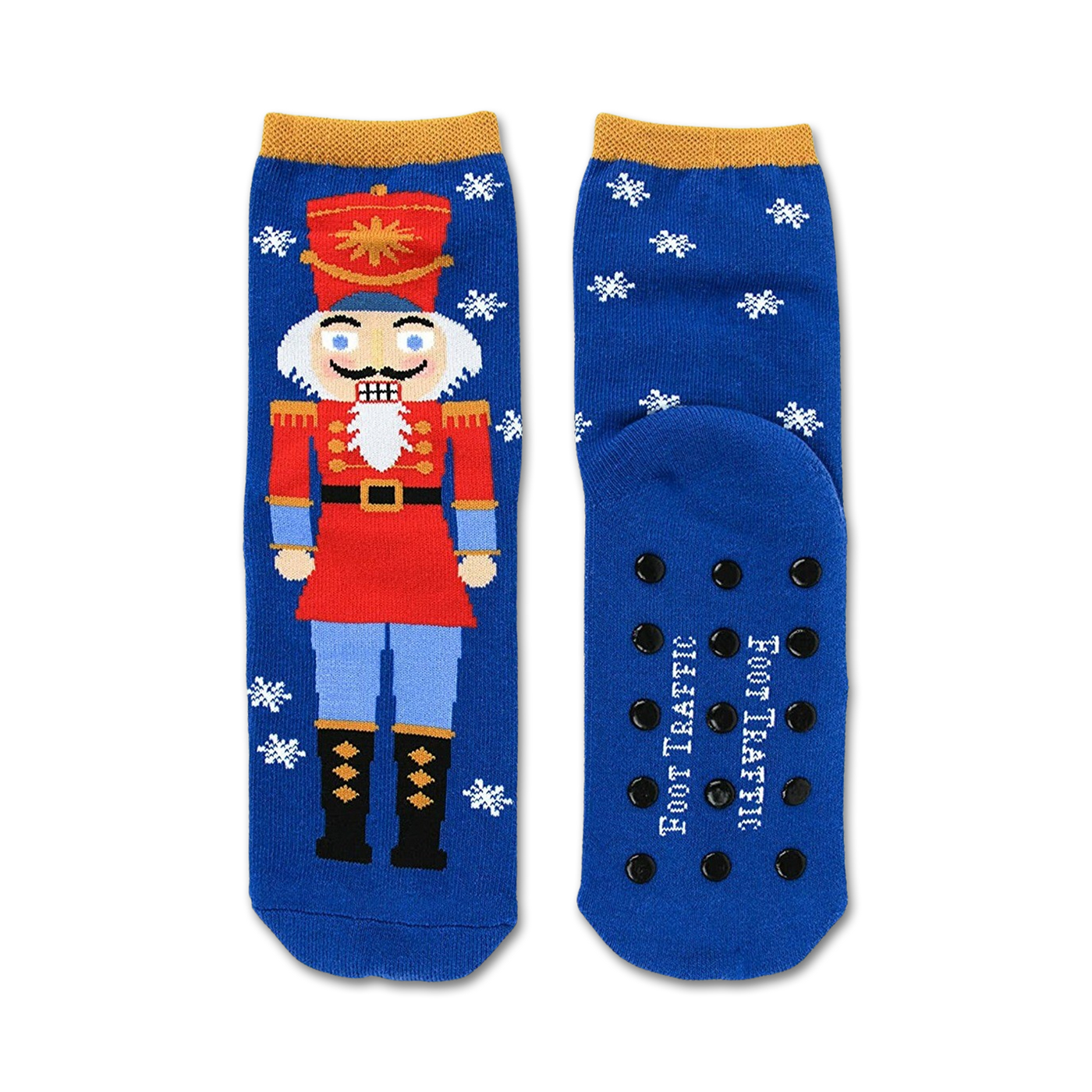 Blue crew socks featuring a Nutcracker design, snowflakes, and non-skid grips on the soles. Red, gold, and white accents.