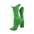Green 3D alligator novelty socks with textured bumps, pink "teeth" cuff, and yellow eye detail. Playful crew socks.