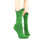 Green crew socks with a 3D alligator face design.  The alligator's mouth is playfully open, showing pink textured inside, yellow eyes are embroidered on.