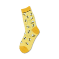 A crew sock in yellow featuring a pattern of small bumblebees with black stripes and white wings, flying along dotted lines.