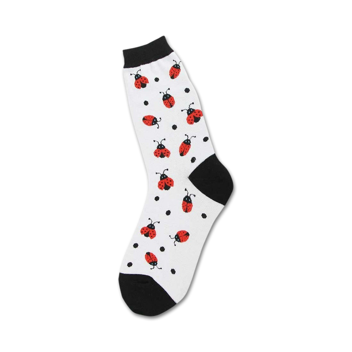  white crew length women's socks with a pattern of red ladybugs with black spots.    }}