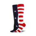 Pair of knee-high socks. One navy blue with white stars, the other red and white striped.  Patriotic American flag theme.