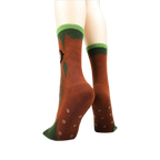 Back view of socks on a model showing the non-skid grip.