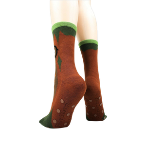 Back view of socks on a model showing the non-skid grip.