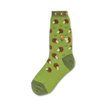 green crew socks with a pattern of brown hedgehogs with peach-colored bellies and an orange flower with a peach colored center.  