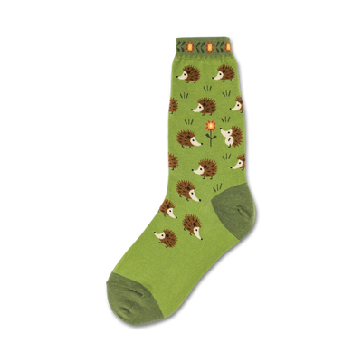 green crew socks with a pattern of brown hedgehogs with peach-colored bellies and an orange flower with a peach colored center.  