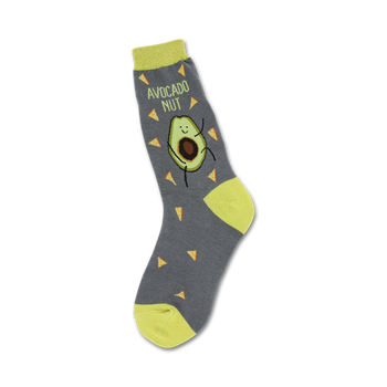  gray crew socks with green cuff, yellow toe and heel. depicting a dancing avocado, tortilla chips scattered about and text: "avocado nut".   
