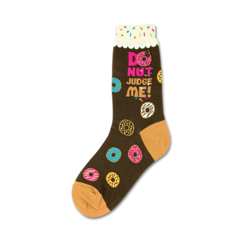 womens novelty crew socks with a brown background and a colorful funfetti donut pattern along with the text donut judge me in pink and purple.  