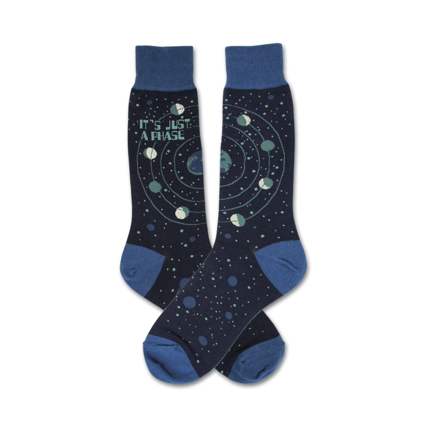 Pair of navy blue crew socks with a celestial design.  Features a repeating pattern of planets orbiting a star, and the text 'It's Just A Phase'.