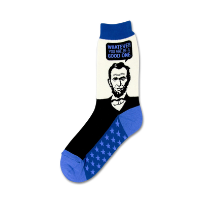 women's abe lincoln crew socks feature black socks with white toe, heel and top with blue star pattern on leg and abraham lincoln's face on front and quote, "whatever you are, be a good one.".  