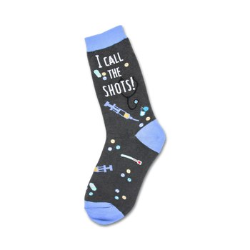 black crew socks with blue toes and heels and the words "i call the shots" and nursing-inspired imagery.  