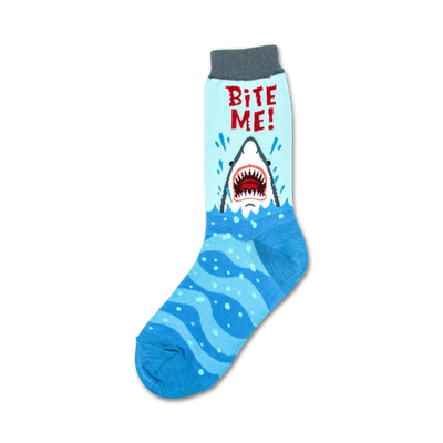 crew-length women's socks featuring a cartoon shark emerging from blue water, with red "bite me" lettering on a gray background.  