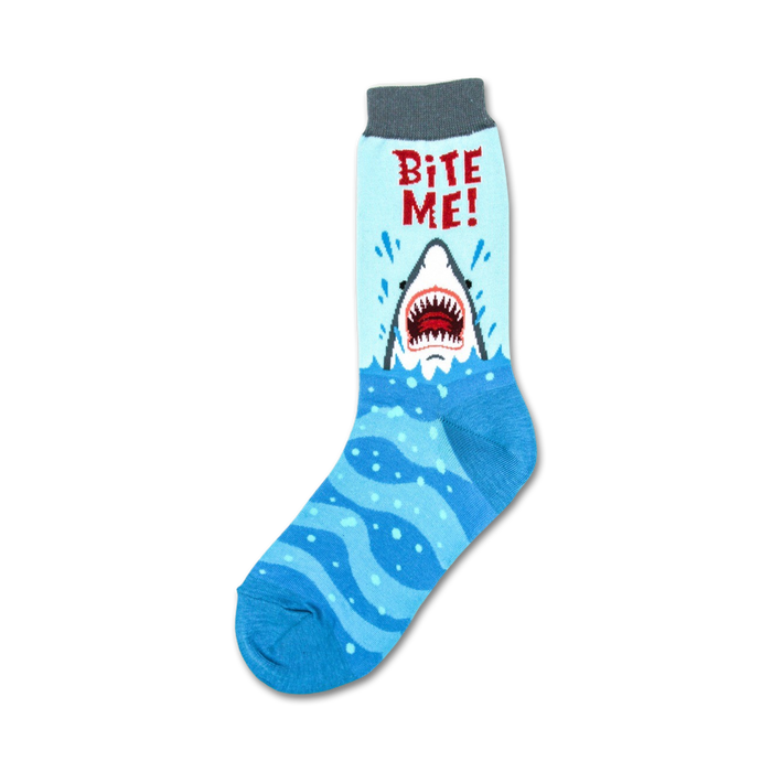 crew-length women's socks featuring a cartoon shark emerging from blue water, with red 