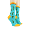 Pair of Cactus socks on mannequin legs showing the full design.