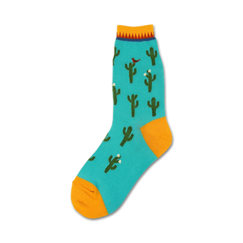 blue women's crew socks feature a pattern of green cacti with white flowers and a red bird perched on one cactus. /n 