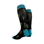 Another view of the black cactus socks from the side, showing the full length.